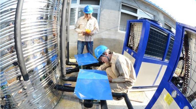 空氣源熱泵供暖養豬示范點送電成功