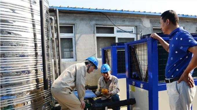 空氣源熱泵供暖養豬示范點送電成功